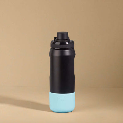 Capa Vyta PACCO 500ml em silicone sustentável, proteção e estilo para garrafas, antiderrapante e durável.