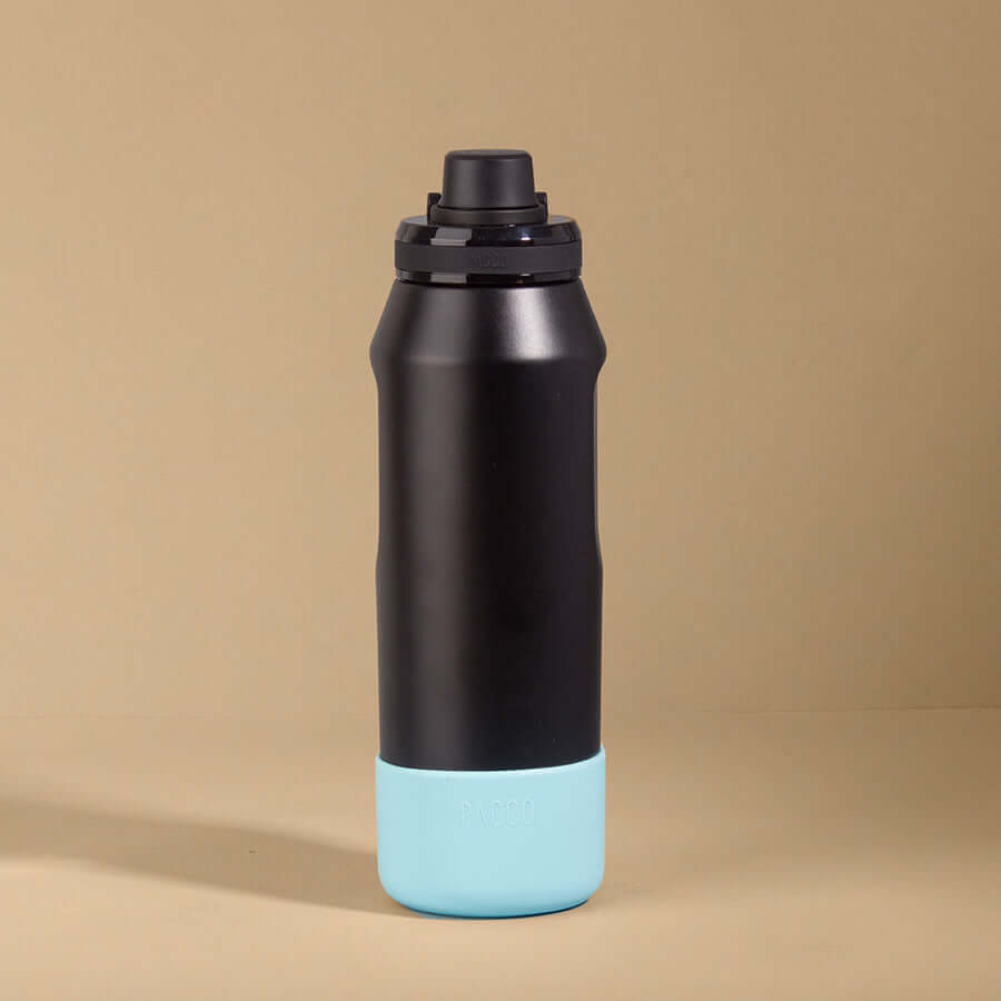 Capa Vyta PACCO 950ml azul em silicone, proteção premium para garrafas, design moderno e impacto sustentável.