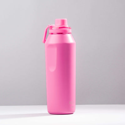 Garrafa Térmica PACCO Vyta 1200ml rosa em fundo cinza, ideal para manter bebidas frias ou quentes com alta durabilidade e estilo.