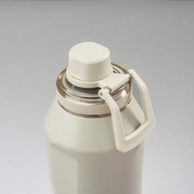 Garrafa Térmica PACCO Vyta 1200ml em aço inox cirúrgico, detalhe da tampa e alça, ideal para manter bebidas frias ou quentes.