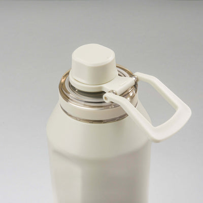 Garrafa Térmica PACCO Vyta 1200ml em aço inoxidável com tampa destacável, ideal para manter bebidas quentes ou frias.