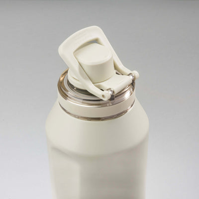 Garrafa Térmica PACCO Vyta 1200ml com tampa vista de cima, destacando elegância e tecnologia térmica para bebidas.