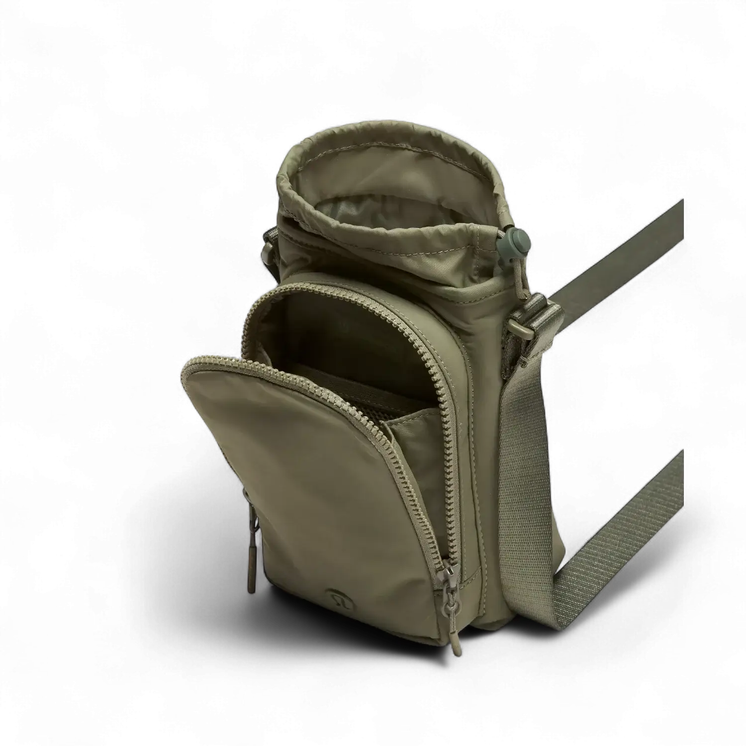 Bolsa para Garrafa Térmica - Cross Bottle Lululemon, leve e funcional, vista de lado com compartimentos abertos, em tom neutro.