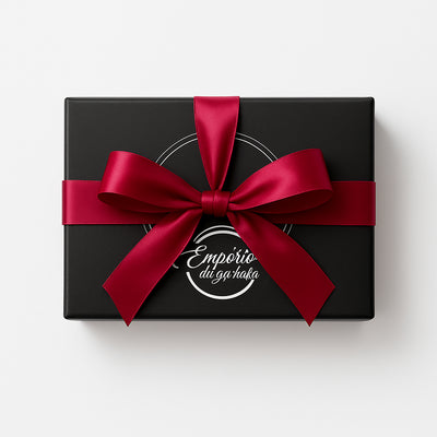 Caixa preta fosca com laço de cetim vermelho, packaging de presente elegante, foco em gift wrapping.