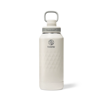 Garrafa Térmica Takeya 950ml Spout Lid Sport, isolamento triplo, mantém bebidas frias por 36h ou quentes por 14h, ideal para esportes.