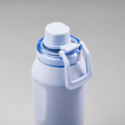 Garrafa Térmica PACCO Vyta 950ml com tampa destacável e design sofisticado em aço inox para conservação térmica eficiente.