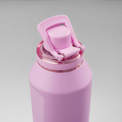 Garrafa Térmica PACCO Vyta 1200ml rosa com tampa ergonômica, feita de aço inoxidável, ideal para manter bebidas frias ou quentes.