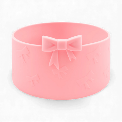 Protetor de Silicone - Laços em rosa para copo ou garrafa, proteção para base, reduz impactos e ruídos, essencial para preservação térmica.