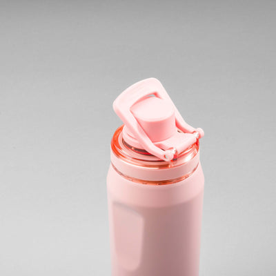 Garrafa Térmica PACCO Vyta 500ml, rosa, com tampa de isolamento térmico em destaque, ideal para bebidas quentes e frias.