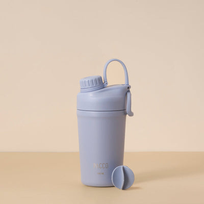 Copo Térmico PACCO Shaker 600ml em cor neutra com tampa, ideal para isolamento térmico e uso em academias ou viagens.