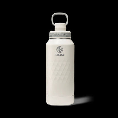 Garrafa Térmica Takeya 950ml Spout Lid Sport, eficiente, mantém bebidas quentes por 14h e frias por 36h, ideal para esportes.