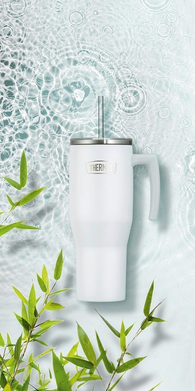 Thermos Copo Térmico Aruba com Canudo -1,1L em aço inoxidável, destacando um fundo aquático e folhas verdes.