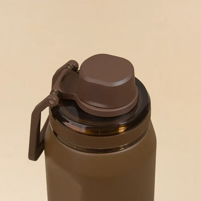 Tampa da Garrafa Térmica PACCO Vyta 500ml em aço inox marrom, destacando o design sofisticado e isolamento a vácuo.