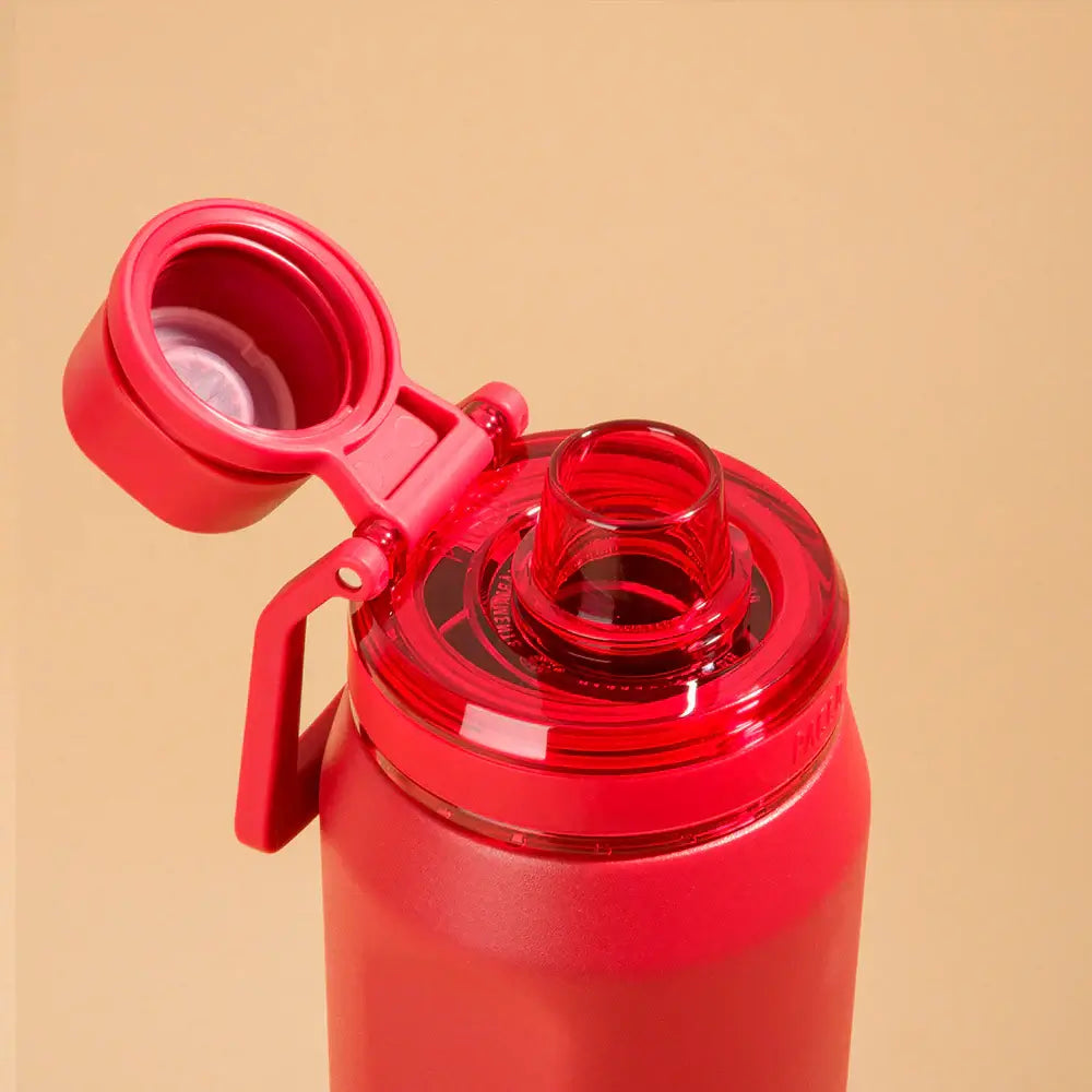 Garrafa Térmica PACCO Vyta 500ml vermelha com tampa aberta, destacando seu design elegante e isolamento térmico de parede dupla.